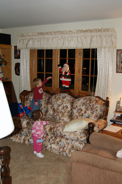 05-12-07, 01, Connor and Kaitlyn checking out Santa Claus