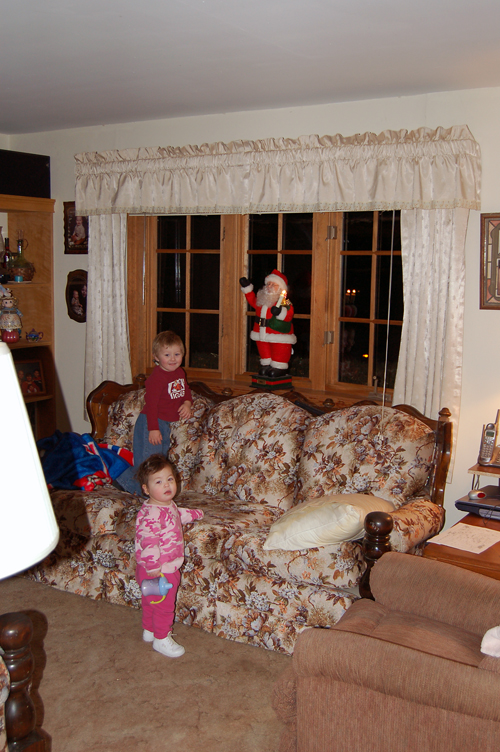 05-12-07, 02, Connor and Kaitlyn checking out Santa Claus