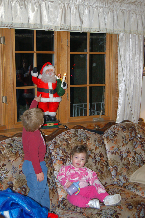 05-12-07, 08, Connor and Kaitlyn checking out Santa Claus