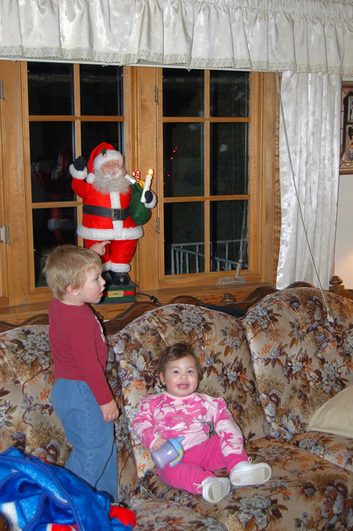 05-12-07, 09, Connor and Kaitlyn checking out Santa Claus