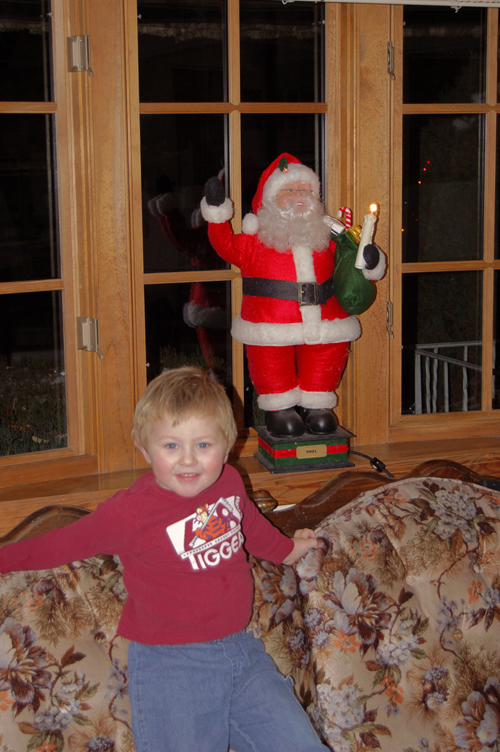 05-12-07, 18, Connor checking out Santa Claus