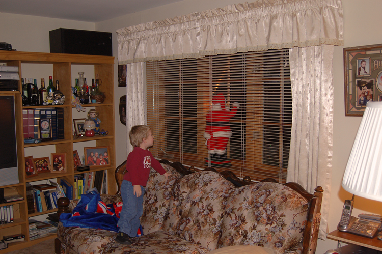 05-12-07, 37, Connor checking out Santa Claus