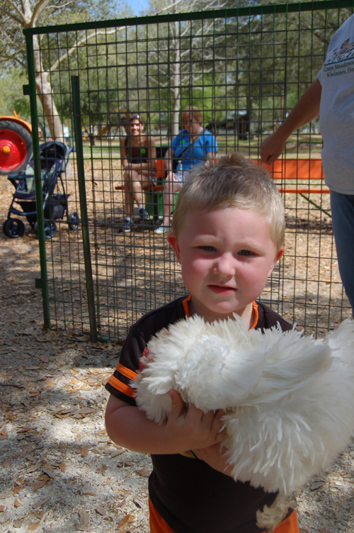 06-03-02, 62, Connor holding Chicken, Green Meadows, Fl