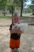 06-03-02, 64, Connor holding Chicken, Green Meadows, Fl