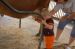 06-03-02, 69, Connor milking a cow, Green Meadows, Fl