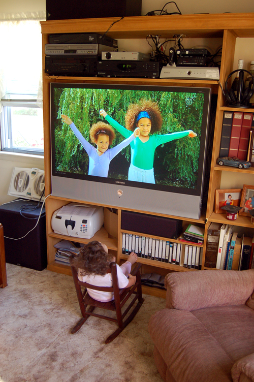 06-08-12, 002, Kaitlyn watching TV, Saddle Brook