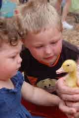 06-03-02, 08, Kaitlyn & Connor looking at duck, Green Meadows, Fl